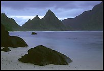 Balsalt boulders on South Beach, Sunuitao Peak in the background, Ofu Island. National Park of American Samoa ( color)