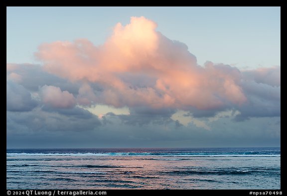 Tropical clouds over Asaga Strait and Pacific Ocean at sunrise, Ofu Island. National Park of American Samoa