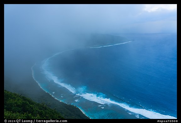 Ofu South Beach and ocean from mountain engulfed in clouds. National Park of American Samoa
