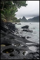 Pools on volcanic rocks and Sunuitao Peak, Ofu Island. National Park of American Samoa ( color)