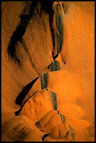 Rock sculptured by flash flood flows on Ayers Rock. Uluru-Kata Tjuta National Park, Northern Territories, Australia ( color)