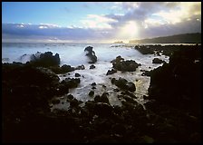 Rocks and surf at sunrise, Keanae Peninsula. Maui, Hawaii, USA