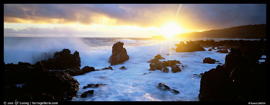 Primeval seascape with surf and rising sun. Maui, Hawaii, USA
