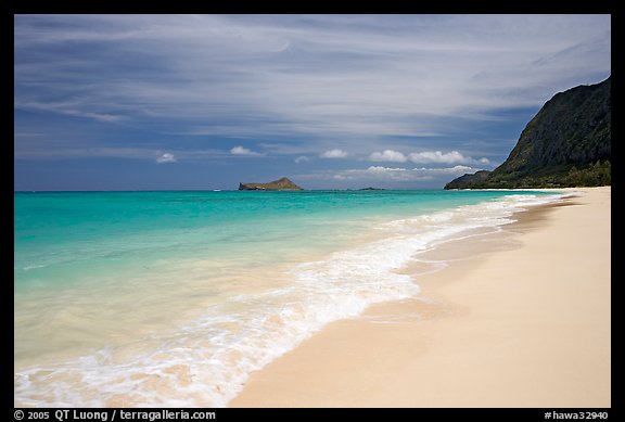 Sand, turquoise waters, and pali, Waimanalo Beach. Oahu island, Hawaii, USA