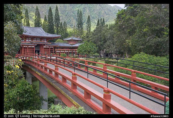 Red bridge leading to Byodo-In Temple. Oahu island, Hawaii, USA