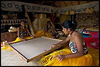 Fiji women playing at a traditional pool table in vale ni bose house. Polynesian Cultural Center, Oahu island, Hawaii, USA
