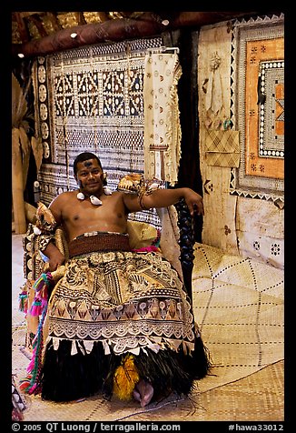 Fiji tribal chief inside vale levu (chief) house. Polynesian Cultural Center, Oahu island, Hawaii, USA (color)
