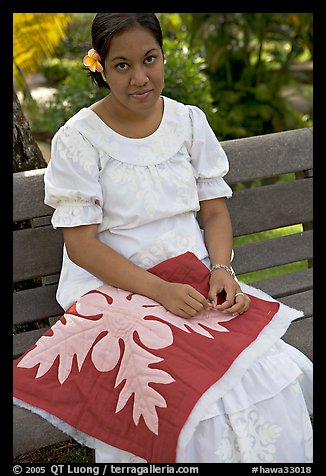 Woman making a traditional hawaiian quilt. Polynesian Cultural Center, Oahu island, Hawaii, USA (color)