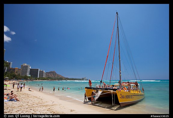 Catamaran and Waikiki Beach. Waikiki, Honolulu, Oahu island, Hawaii, USA (color)