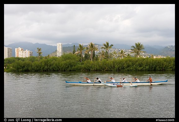 Outrigger canoe along the Ala Wai Canal. Waikiki, Honolulu, Oahu island, Hawaii, USA