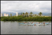 Outrigger canoe along the Ala Wai Canal. Waikiki, Honolulu, Oahu island, Hawaii, USA (color)
