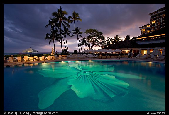 Swimming pool at sunset, Halekulani hotel. Waikiki, Honolulu, Oahu island, Hawaii, USA (color)