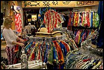 Woman shopping hawaiian dresses. Waikiki, Honolulu, Oahu island, Hawaii, USA (color)