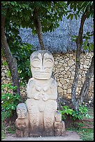 Marquesas statue and walls. Polynesian Cultural Center, Oahu island, Hawaii, USA (color)
