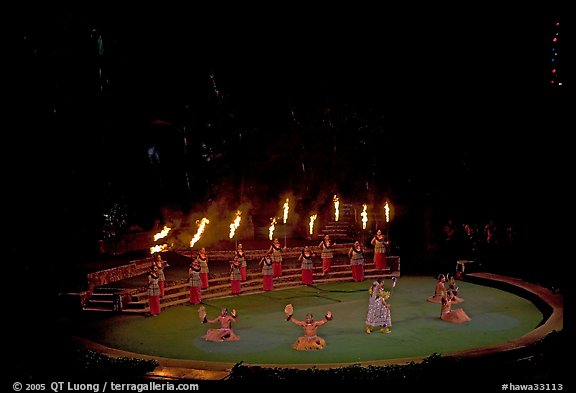 Wedding procession led by torch bearers performed by Tahitian dancers. Polynesian Cultural Center, Oahu island, Hawaii, USA