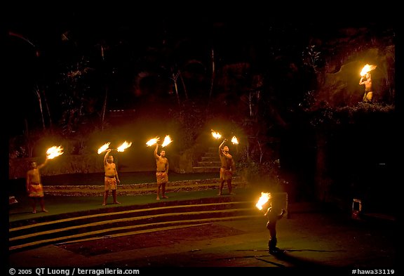Dance with fire performed by Samoans. Polynesian Cultural Center, Oahu island, Hawaii, USA (color)