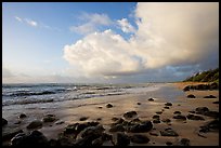 Boulders, beach and clouds, Lydgate Park, sunrise. Kauai island, Hawaii, USA