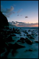 Boulders and misty surf from Kee Beach, dusk. Kauai island, Hawaii, USA
