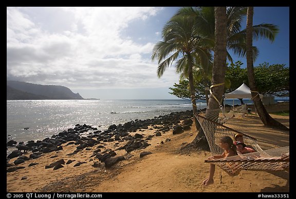 Family on Hammock, Puu Poa Beach. Kauai island, Hawaii, USA (color)