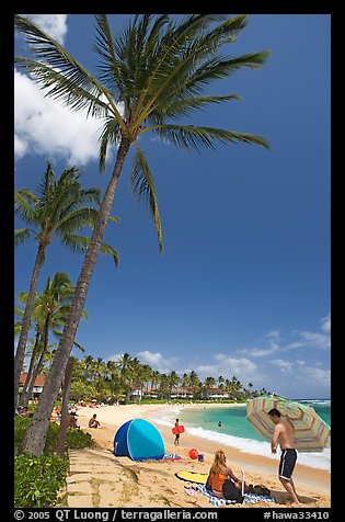 Couple and tent, Sheraton Beach, mid-day. Kauai island, Hawaii, USA (color)