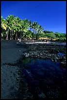 Beach of basalt black sand  at Punaluu. Big Island, Hawaii, USA