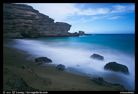 Blurred waves and cliff, Papakolea Beach. Big Island, Hawaii, USA