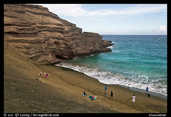 People on Mahana (green sand) Beach. Big Island, Hawaii, USA