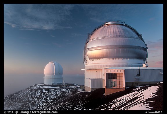 Recent snow and telescopes at sunset. Mauna Kea, Big Island, Hawaii, USA