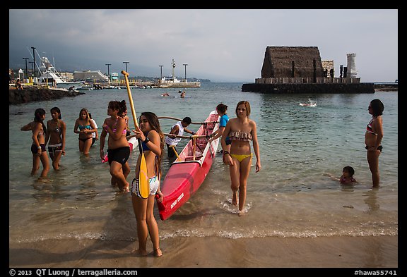 Girls and outrigger canoe, Kailua-Kona. Hawaii, USA