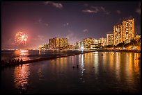 Watching fireworks from seawall, Kuhio Beach, Waikiki. Waikiki, Honolulu, Oahu island, Hawaii, USA ( color)