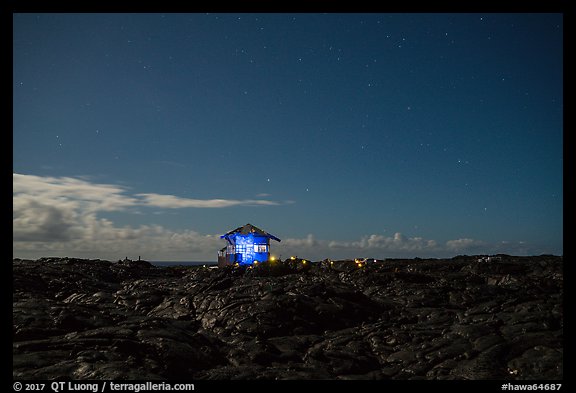 Illuminated house on the lava field, Kalapana. Big Island, Hawaii, USA