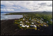 Aerial view of residential community on edge of lava field. Big Island, Hawaii, USA ( color)
