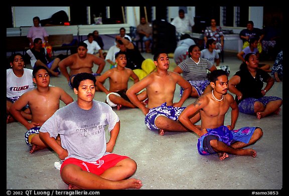 Villagers getting ready for traditional dance, Aua. Tutuila, American Samoa (color)