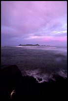 Sunset over Aunuu island with crab on basalt rock. Aunuu Island, American Samoa ( color)