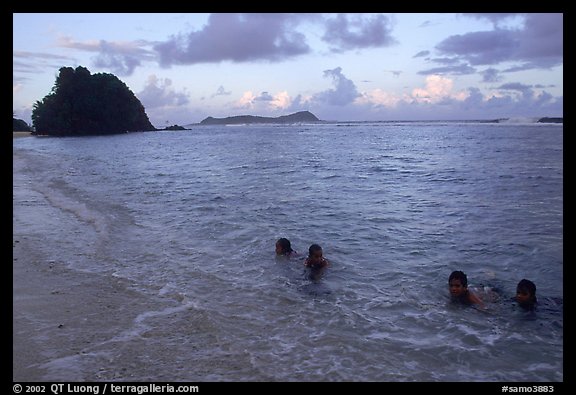 Children in the water. Tutuila, American Samoa