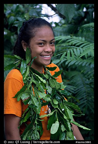 Girl with ornemental leaves in traditional fashion. Pago Pago, Tutuila, American Samoa