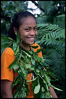 Girl with ornemental leaves in traditional fashion. Pago Pago, Tutuila, American Samoa (color)