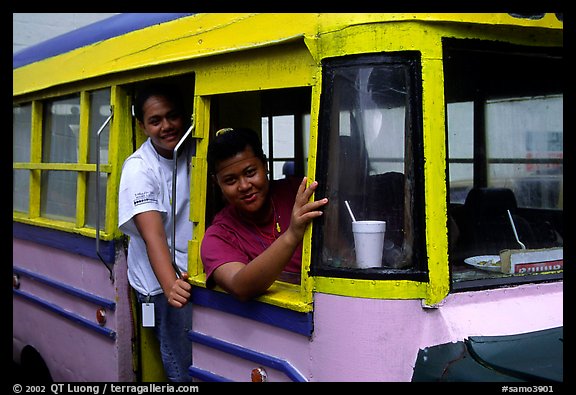 Women in a colorful bus. Pago Pago, Tutuila, American Samoa (color)