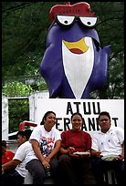 Women in front of statue of Charlie the Tuna. Pago Pago, Tutuila, American Samoa ( color)