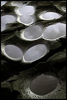 Ancient grinding stones holes (foaga) near Leone. Tutuila, American Samoa (color)