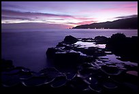 Grinding stones holes (foaga) filled with water at dusk, Leone Bay. Tutuila, American Samoa ( color)