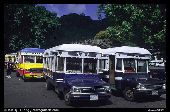 Decorated aiga busses, Pago Pago. Pago Pago, Tutuila, American Samoa (color)