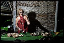 Tisa Faamuli serving Samoan Umu Feast. Tutuila, American Samoa ( color)