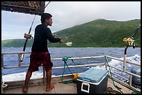 Samoan man fishing on alia boat. American Samoa ( color)