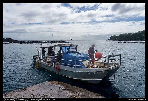 Alia boat departing from Fleasao harbor, Tau Island. American Samoa (color)