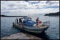 Alia boat departing from Fleasao harbor, Tau Island. American Samoa ( color)