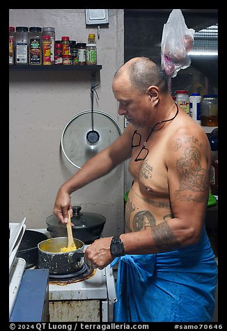 Manaia cooking, Tau Island. American Samoa (color)