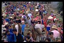 Colorful crowd at the sunday market, where people from the surrounding hamlets gather weekly to meet, shop and eat