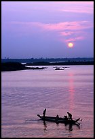 Boat and sunrise, Tonle Sap,  Phnom Phen. Cambodia (color)