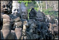 Statues near the gates of the temple complex. Angkor, Cambodia